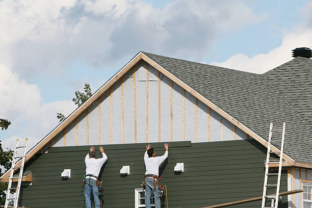 Professional Emergency Siding Repair technician working in Claridge, PA